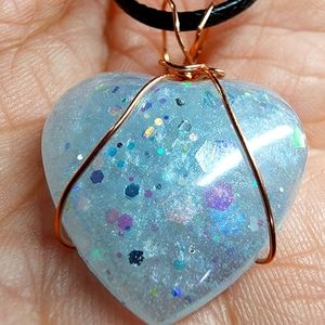NWOT, handcrafted baby blue glitter resin heart shaped cabochon neclace